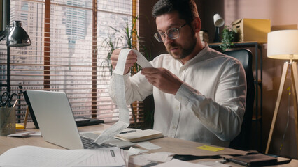 Frustrated upset Caucasian male accountant reading bills man stress employee leader executive guy...
