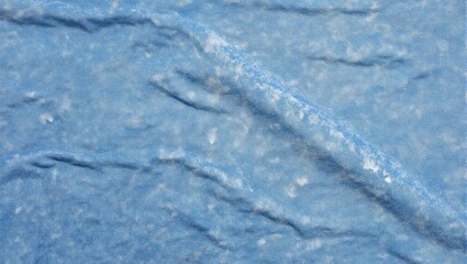 Soft blue chambray fabric with faded creases offering a comfortable and casual look