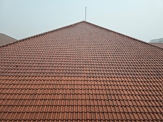 Clay tile roof. Building house construction.