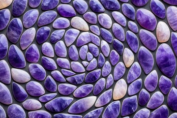 Obraz premium Glowing amethyst gemstones arranged in a spiral pattern on a black background, creating a mystical and luxurious aesthetic