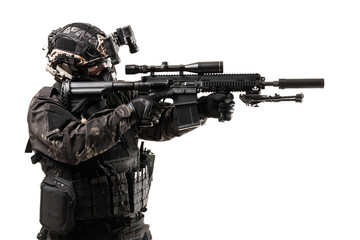 Tactical Operative with Advanced Equipment in Action Holding Precision Rifle