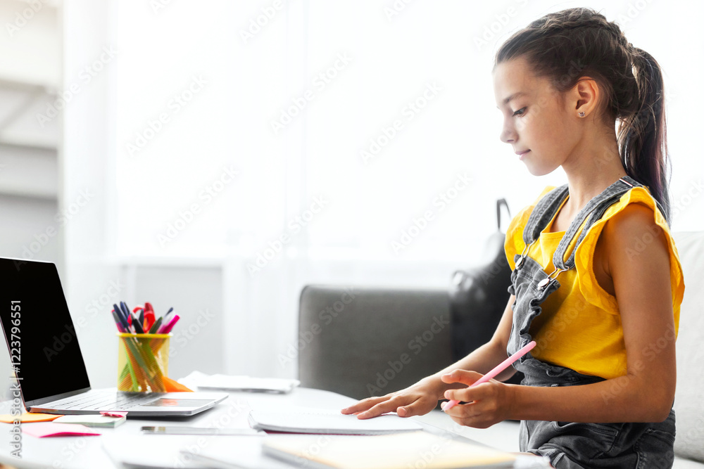 Poster online education concept. profile side view of school girl studying at home, writing in her copybook