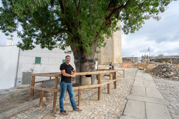 Ash tree with a sword surrounding the trunk, giving rise to the name of the locality Freixo de Espada á Cinta.