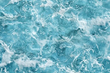Obraz premium Capturing the mesmerizing movement of ocean waves, this image showcases the vibrant blue hues and frothy white crests that create captivating and dynamic natural patterns on the water's surface