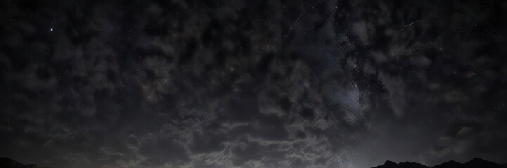 Fototapeta premium Dark night sky with twinkling stars against a black canvas, universe, astronomy