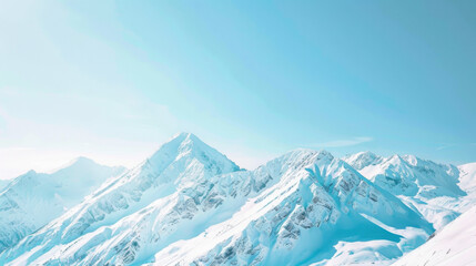 Obraz premium Majestic snow covered mountains under clear blue sky create serene winter landscape. peaks rise dramatically, showcasing beauty of nature
