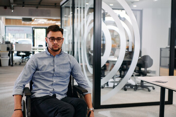 In a large modern corporation, a determined businessman in a wheelchair navigates through a hallway, embodying empowerment and inclusivity in the corporate world