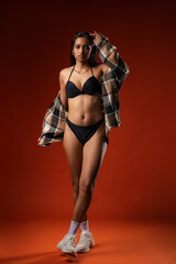 Photo of slim woman with beautiful abdomen 