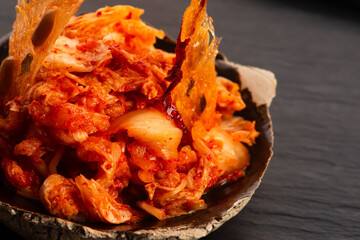 Kimchi with Chopsticks with glass potatoe chips