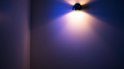 Soft Blue Light Illuminating a Minimalist Wall in a Dark Room