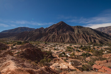 panoramic view of the village of Purmamarca in Jujuy, Argentina. Landscape with colored mountains and hills
