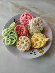 pasta with sauce,colorful crackers