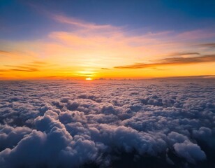 Beautiful sunset cloudy sky from aerial view. Airplane view above