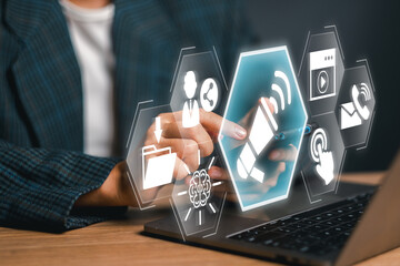 Interactive digital icons and smartphone illustrating a call to action concept in a modern business...
