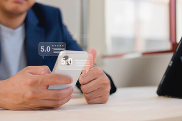 customer service evaluation and feedback rating. costumer review concept, man using phone chooses happy smiling face