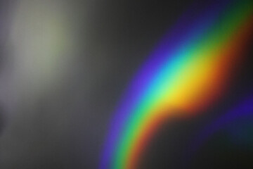 Trendy abstract background with phenomenon rainbow colors fragments in selective focus