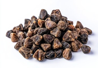 Obraz premium Heap of dried dark plums on white background.