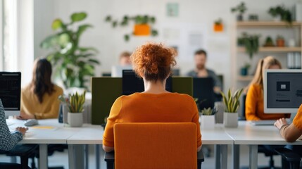 Focused Office Environment with Diverse Professionals Working at Desks Surrounded by Plants and Technology