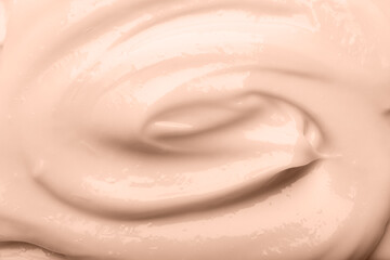 Obraz premium Body cream, top view. Mocha mousse - color of 2025 year