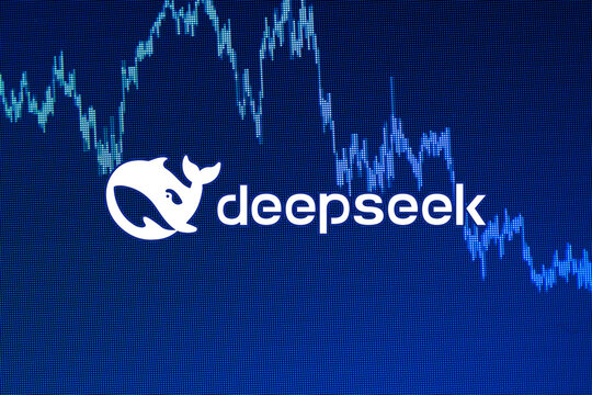 Deepseek logo on the modern digital background of a falling stock market graph. Artificial intelligence chatbot. Valencia, Spain - January 28th 2025