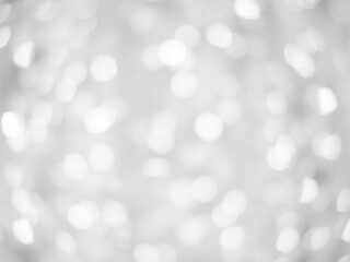 Obraz premium Abstract background of sparkling silver and white lights creating a dreamy and magical atmosphere, white, blurry