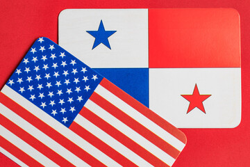 American and panamanian flags on red background
