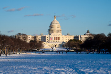 U.S. Capitol Building in after a snowstorm in Washington DC, United States at the end of the day.