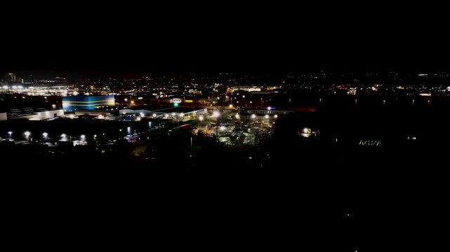 Aerial view of Residential homes and Business in Belfast City Skyline Cityscape Northern Ireland by night black background at night 27-01-25