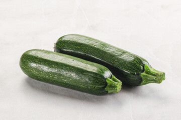 Raw green ripe zucchini vegetable