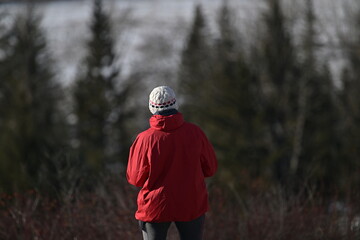 person in a red jacket