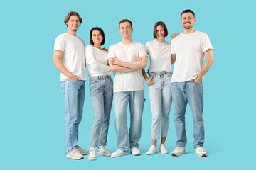 Fototapeta premium Group of young people in jeans on blue background