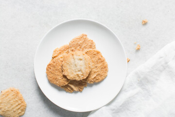 Overhead view of gurundi chips, top view of nigerian coconut biscuits, Nigerian coconut cookies made with coconut and cassava