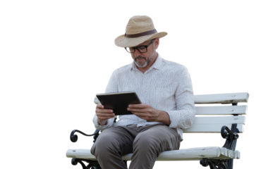 Man sitting on a bench, reading on a tablet, wearing glasses and straw hat, relaxed atmosphere, outdoor leisure activity, enjoying quiet time.