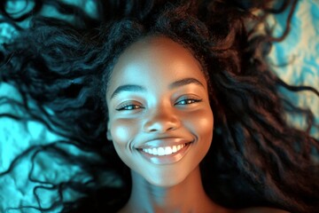 Fototapeta premium Long hairdo - gorgeous bush hair. Lovely smiling black girl - for ads, flyer and internet use. Commercial ad conceptual art. Glamorous african portrait shoot. Stunning african advertising.