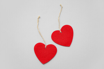 Heart shaped decorations with ropes on white background. Valentine's Day celebration