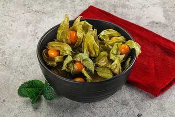 Sweet ripe physalis in the bowl