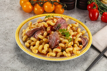 Italian pasta cellentani with anchovy