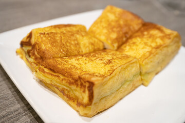 Egg toast with kaya butter on the plate