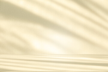 Obraz premium Wall interior background, studio and backdrops show products. with leaf shadow from window color beige and white. background for text insertion and presentation of product 