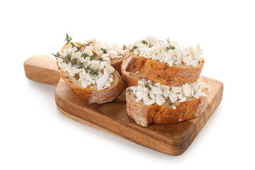 Wooden board of bread slices with fresh cottage cheese and thyme on white background