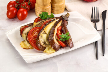 Baked tomato with mozzarella and tomato