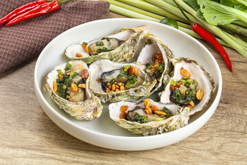 Baked oysters with green onion