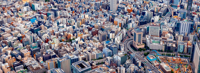 Aerial view of skyscrapers and expressways in Chuo City, Tokyo, Japan