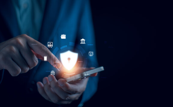 Cyber ​​security and internet data protection concept, businessman using smartphone with padlock icon encryption security protect business and financial data, cloud computing.