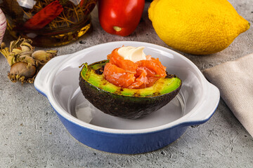 Whole grilled avocado with salmon