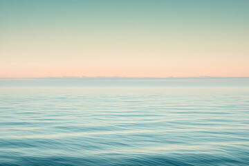 Obraz premium Serene ocean view at dawn, gentle waves reflecting pastel colors, tranquil atmosphere, horizon line
