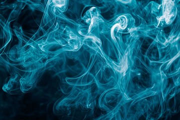 Obraz premium Ethereal blue smoke swirling gracefully against a dark background, creating a mystical atmosphere