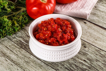 Diced ripe tomato with sauce