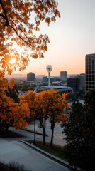 Naklejka premium Autumn sunrise cityscape view, tower, city park, calm background, ideal for travel brochures
