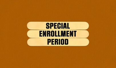 Concept word SEP Special Enrollment Period on beautiful wooden stick. Beautiful Orange Chart Paper Background. Business and SEP Special Enrollment Period concept. Copy space